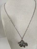 Collier fleur acier inoxydable